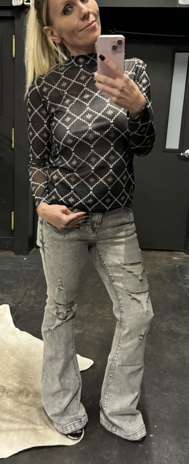 Destroyed mid rise stretch flare with trouser hem