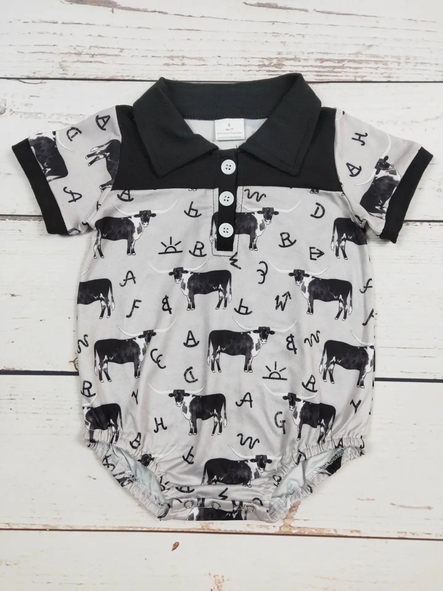 Black Cows Tags Boys onsie