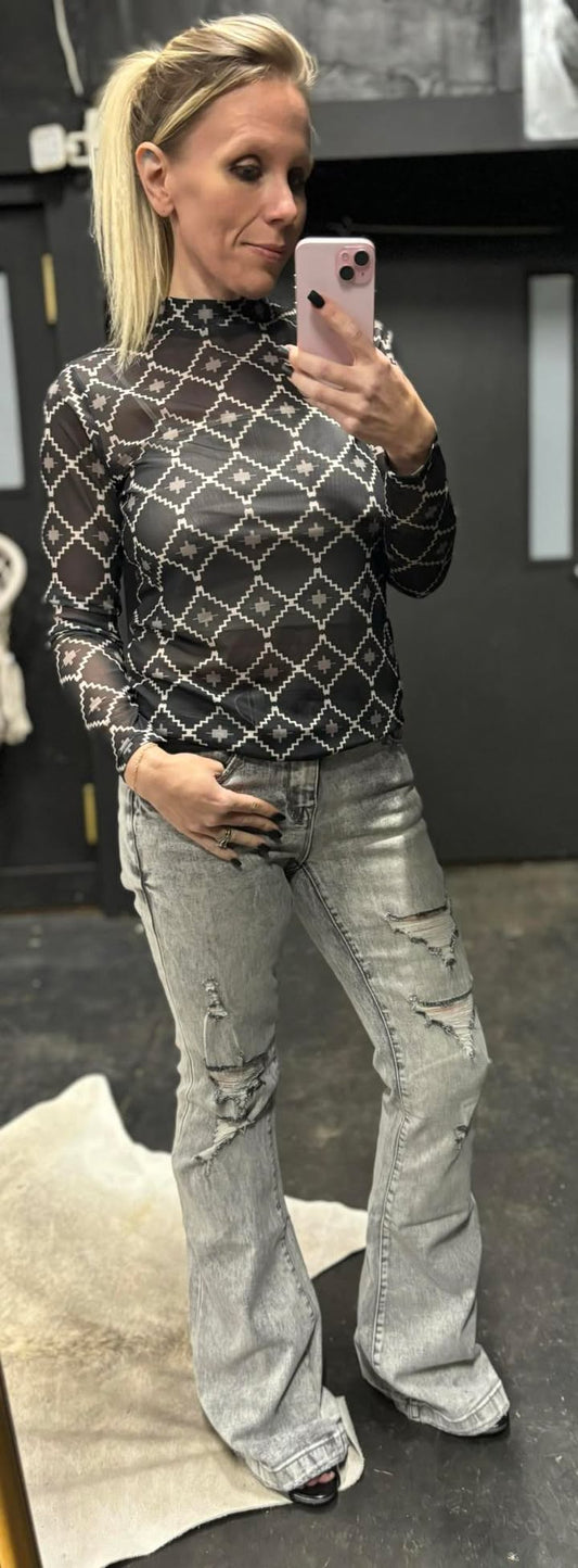 Destroyed mid rise stretch flare with trouser hem